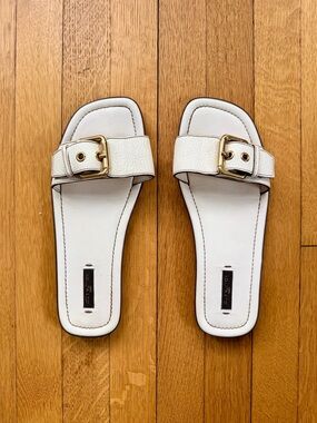 Louis Vuitton White Slide Sandals with Gold Buckle